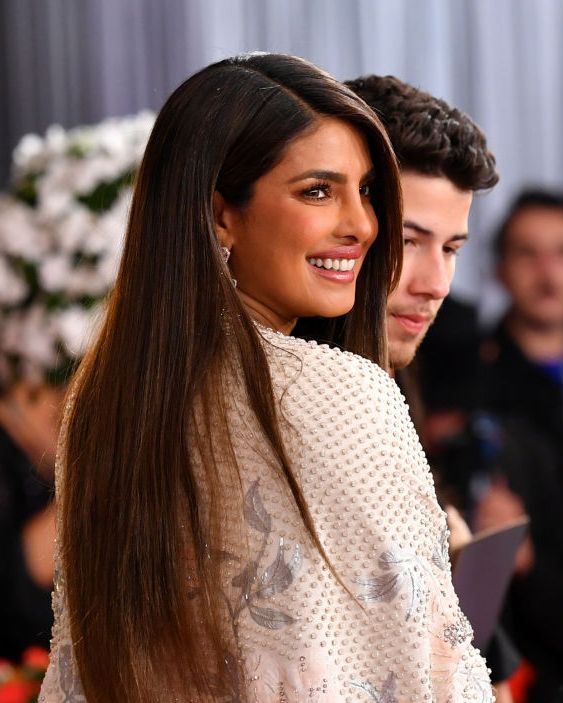 long hair inspiration, los angeles, california   january 26 l r priyanka chopra and nick jonas attend the 62nd annual grammy awards at staples center on january 26, 2020 in los angeles, california photo by amy sussmangetty images