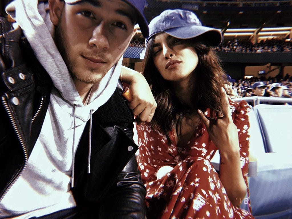 Photo: Priyanka Chopra and Nick Jonas snuggle up in throwback