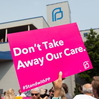 a sign that reads don't take away our care with the hashtag standwithpp