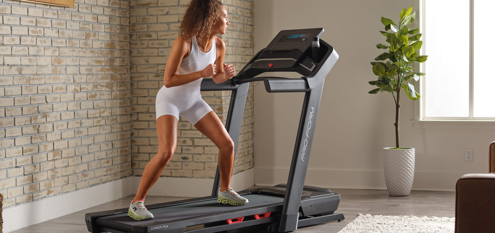 person walking sideways on treadmill