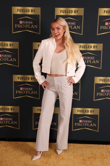 gymnast olivia dunne joins forces with purina pro plan at the premiere of fueled by, a docuseries highlighting the vital role nutrition plays in her active lifestyle with her dog roux, at the whitby hotel, wednesday, june 26, 2024 in new york jason decrowap content services for purina pro plan