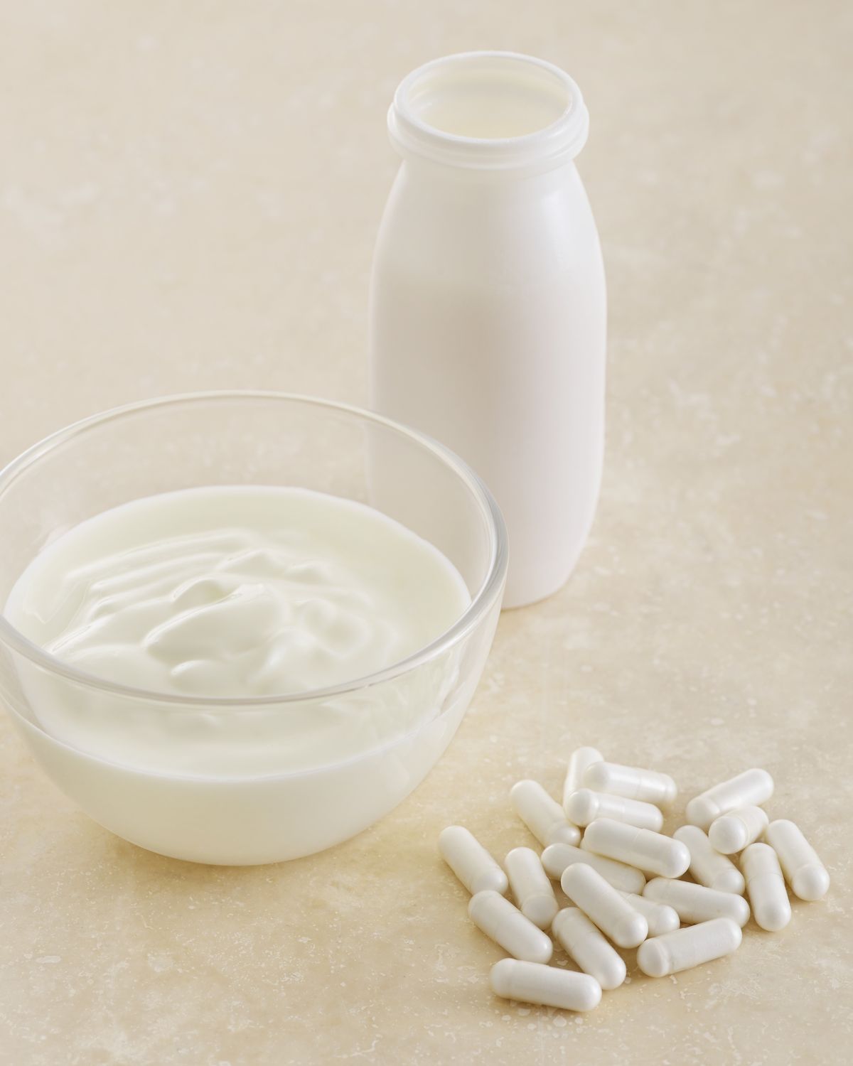 Probiotic pills and yoghurt