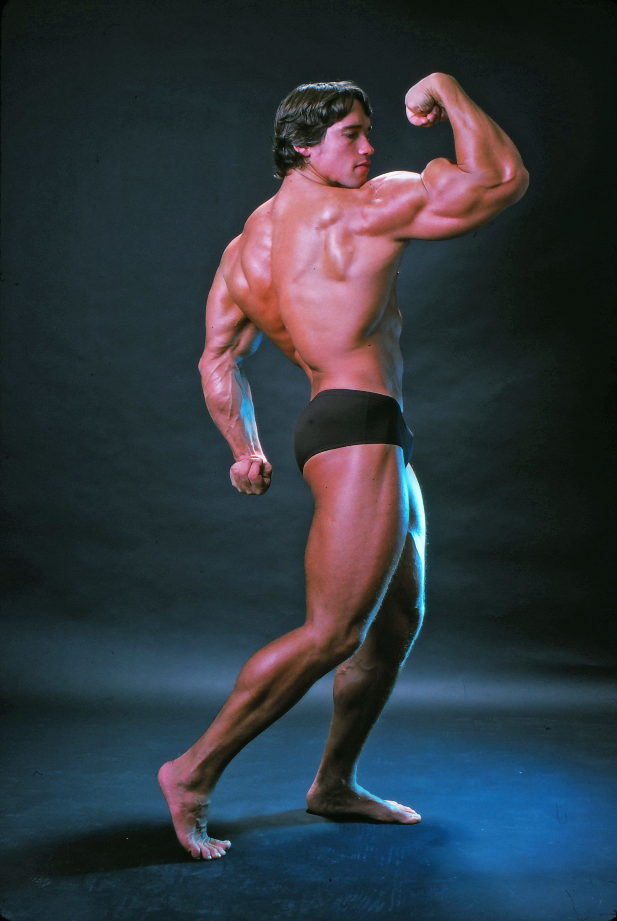 Professional bodybuilder Arnold Schwarzenegger posing at the top of... News  Photo - Getty Images