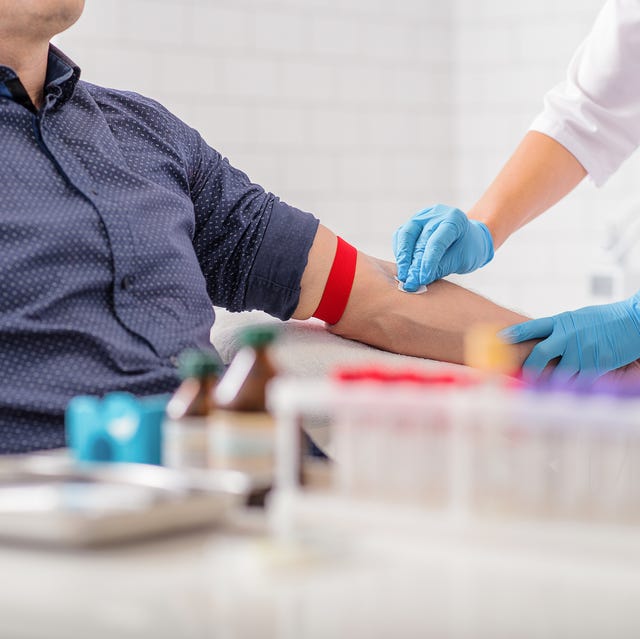 Professional doctor preparing patient for procedure