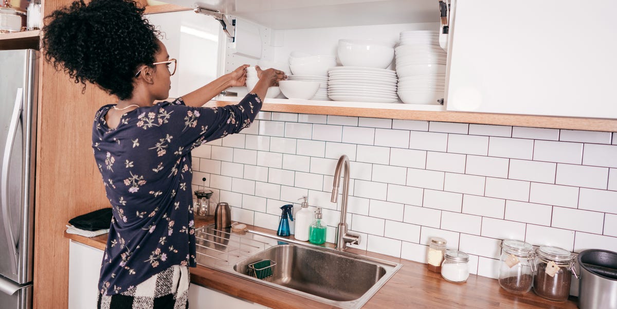 Minimizing rental risks owner organizing the kitchen