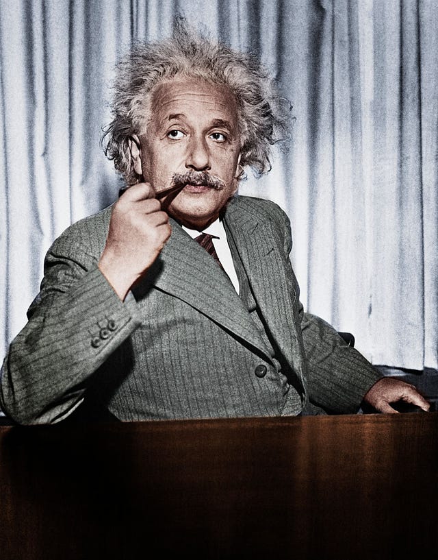 Albert Einstein Smoking Pipe at Table