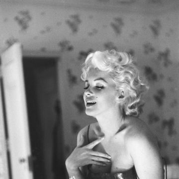 new york march 24 actress marilyn monroe poses for a candid portrait with a bottle of chanel no 5 perfume on march 24, 1955 at the ambassador hotel in new york city, new york photo by ed feingershmichael ochs archivesgetty images