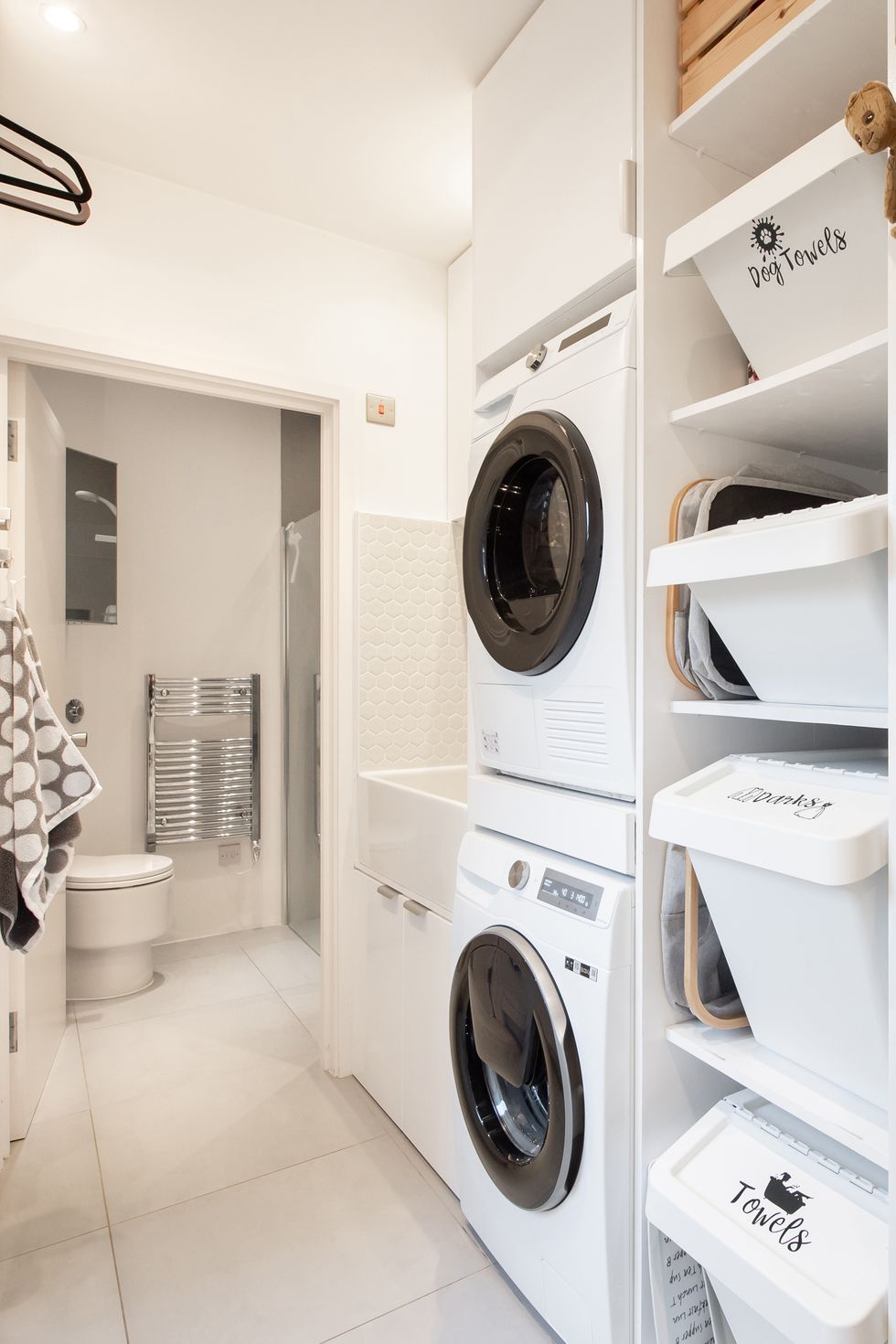 laundry room with sorted laundry bins