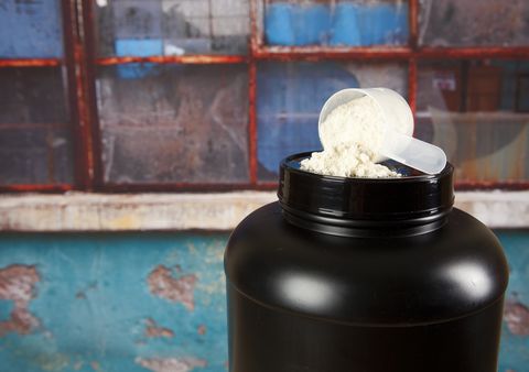Protein powder and black plastic container