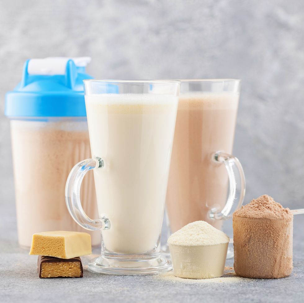 protein shake bottle, powder and bars