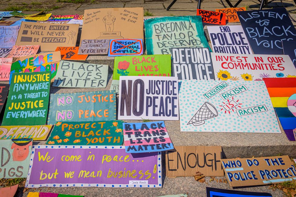 protest signs provided by signs for blm art colective