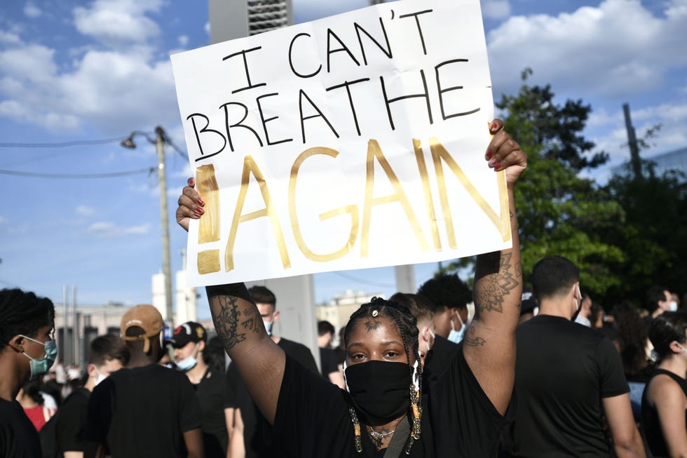 sign that reads 'i can't breathe again'