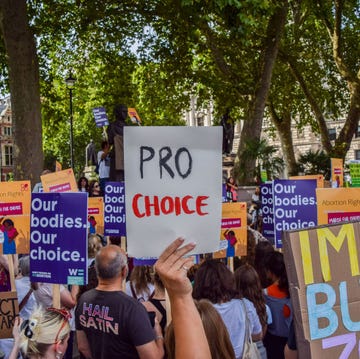 a protester holds a "pro choice" placard during the