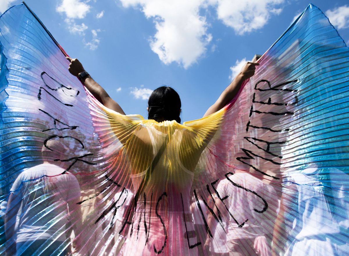 a protestor displays wings while marching on on june 14, 2020 in the brooklyn borough of new york city protests continue in locations all around the country in the wake of the death of george floyd while in minneapolis police custody on may 25