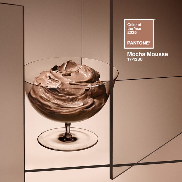 chocolate mousse in a glass bowl with muted background elements
