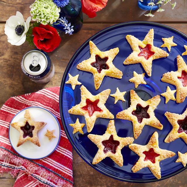 puff pastry star cookies on a cobalt blue glass platter