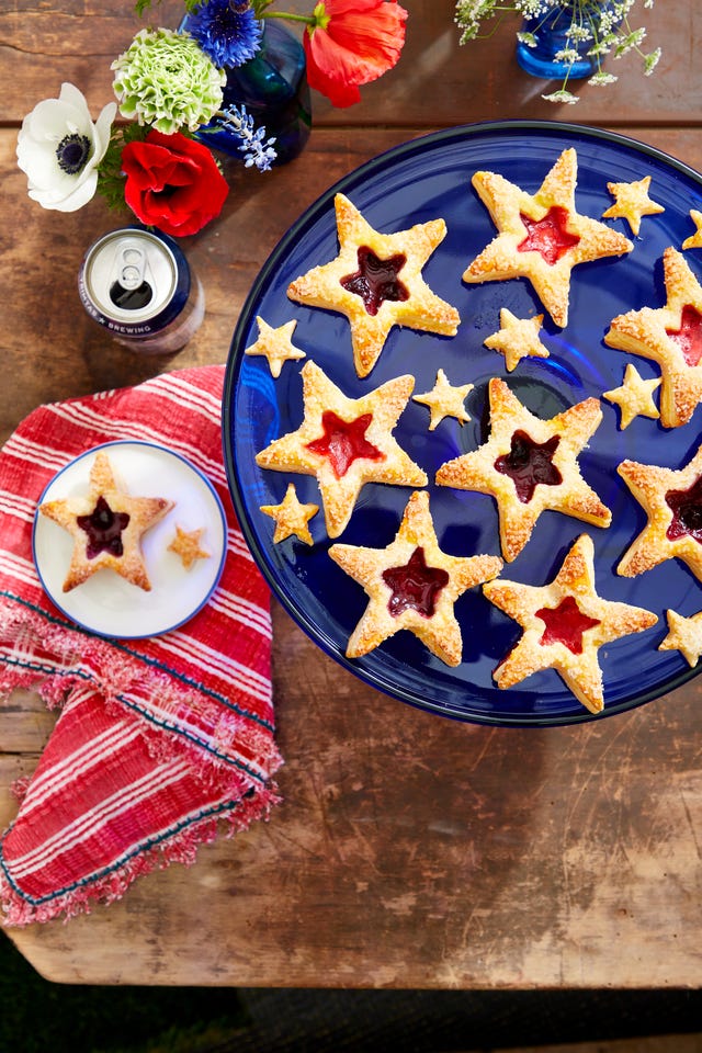 puff pastry star cookies on a cobalt blue glass platter