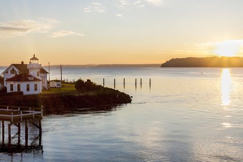 puget sound, mukilteo lighthouse and whidbey island at sunset