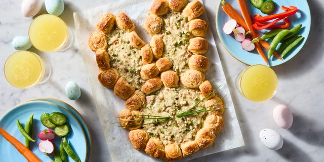 pull apart biscuit appetizer filled with dip shaped like an easter bunny