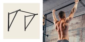 man hanging from a wall mounted pull up rack