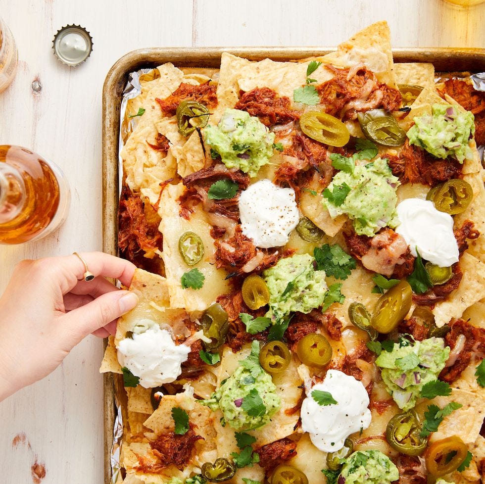 preview for Pulled Pork Nachos Are Guaranteed To Draw A Crowd