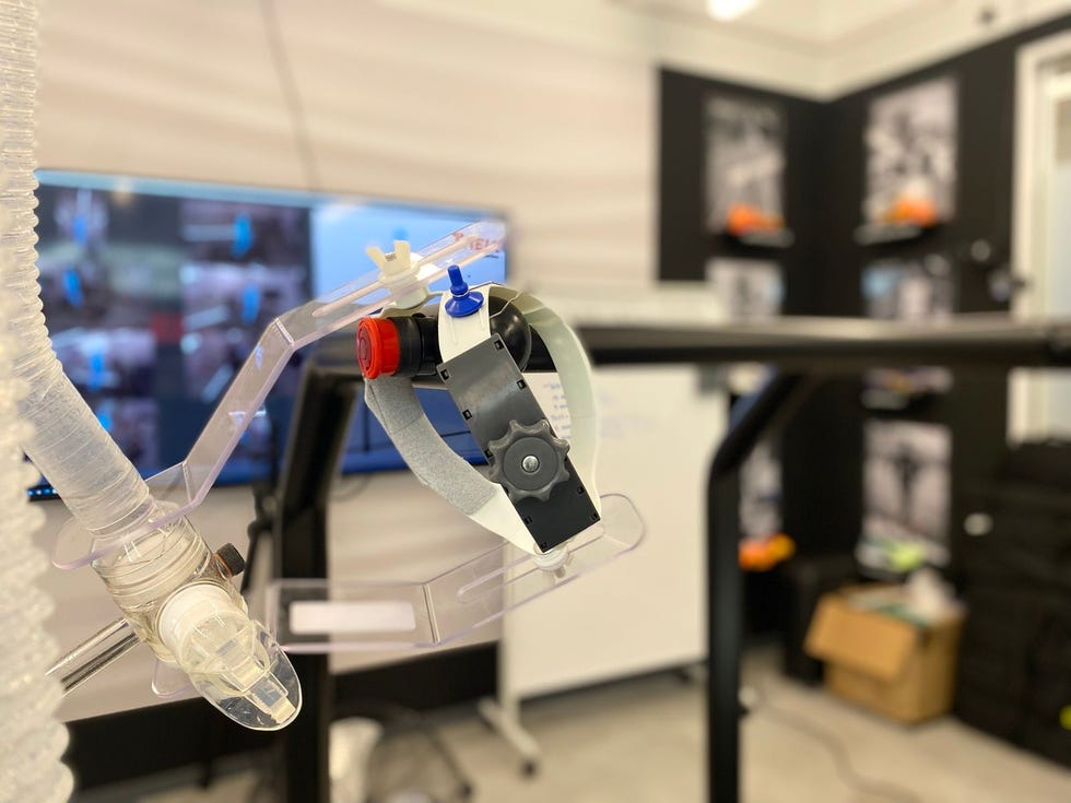 mask and a treadmill in a running performance lab