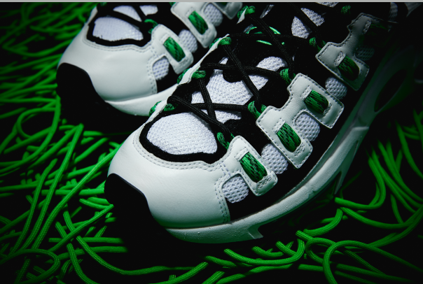 Footwear, Green, White, Shoe, Sneakers, Athletic shoe, Walking shoe, Grass, Outdoor shoe, Tennis shoe, 