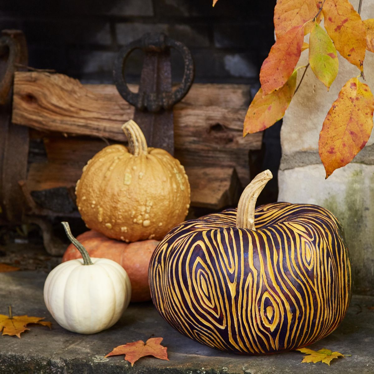 pumpkin carved in faux bois design using linoleum cutting tools