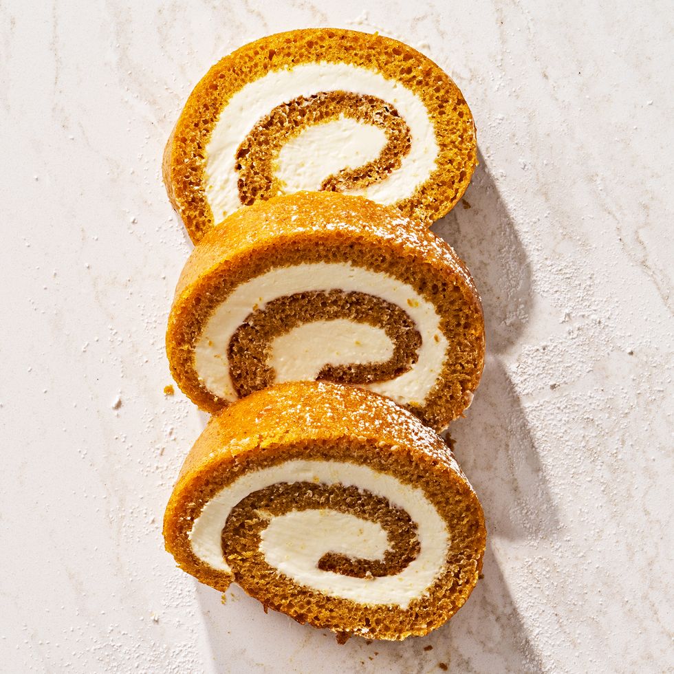 pumpkin cheesecake roll with a cream cheese swirl