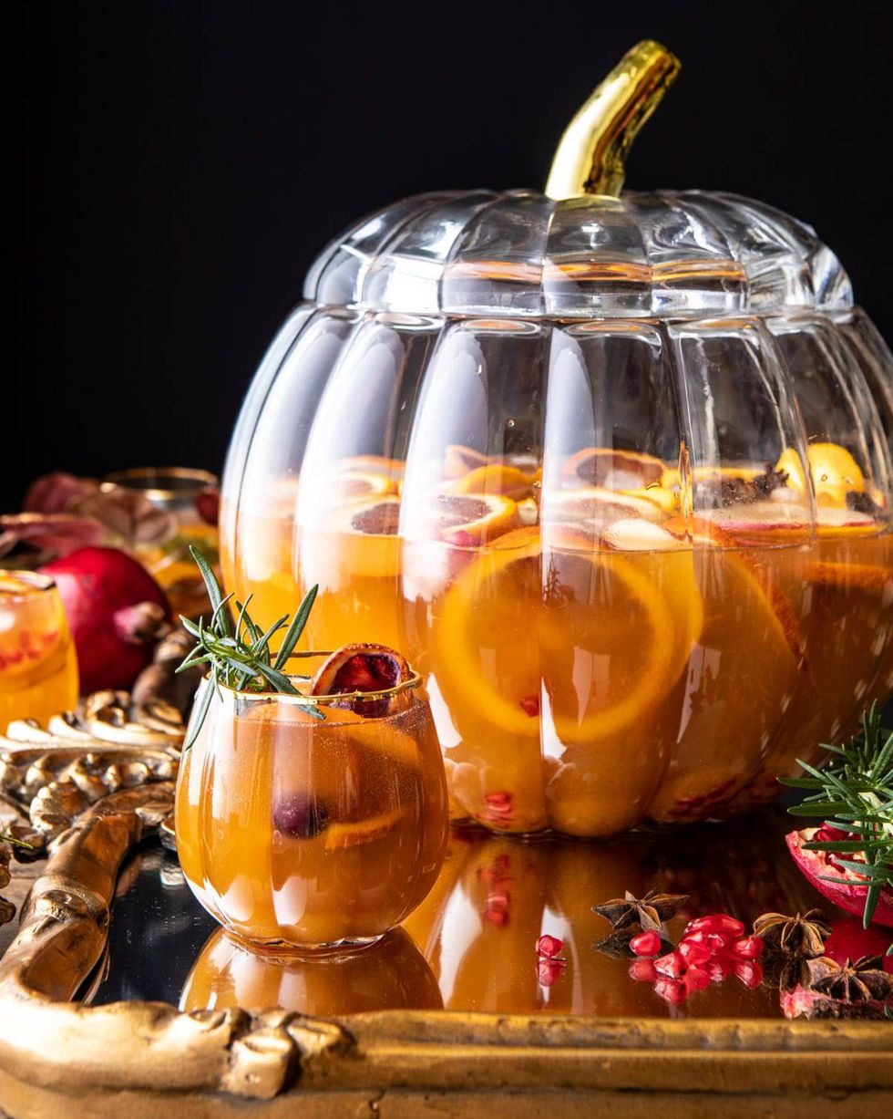 thanksgiving sangria with big pumpkin container