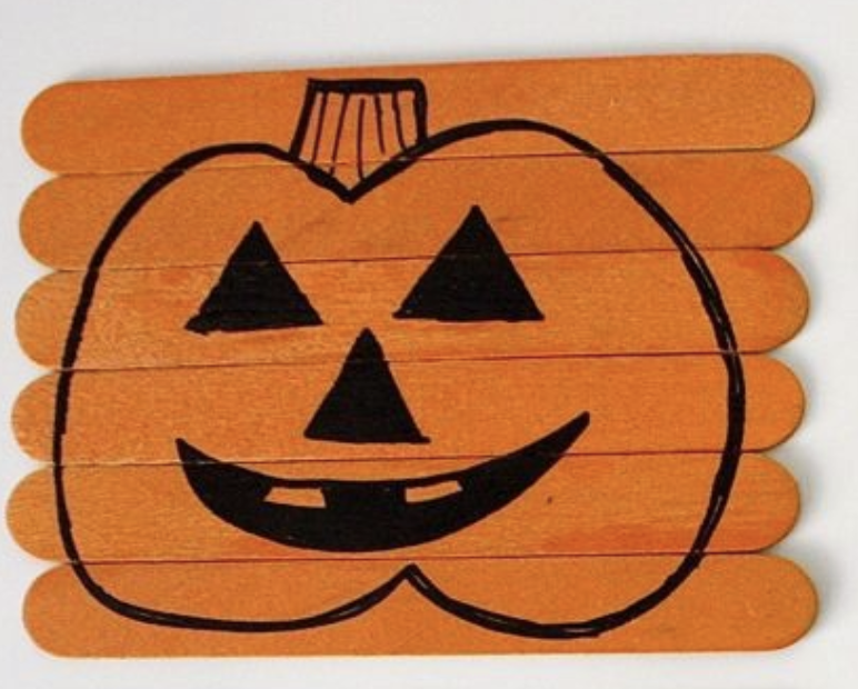 pumpkin puzzle made from popsicle sticks and markers