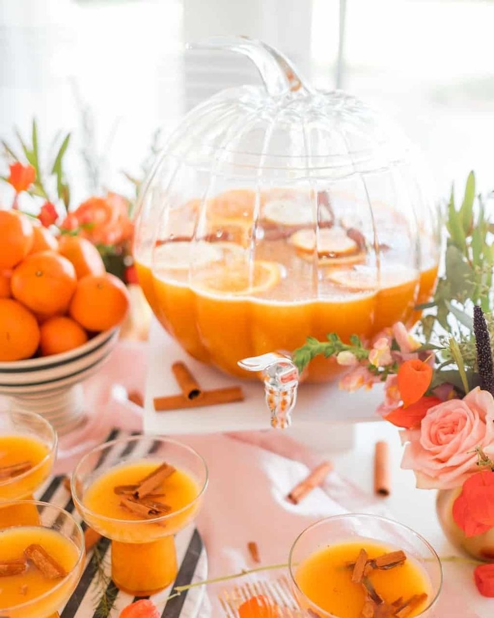 holiday pumpkin punch with flowers and oranges