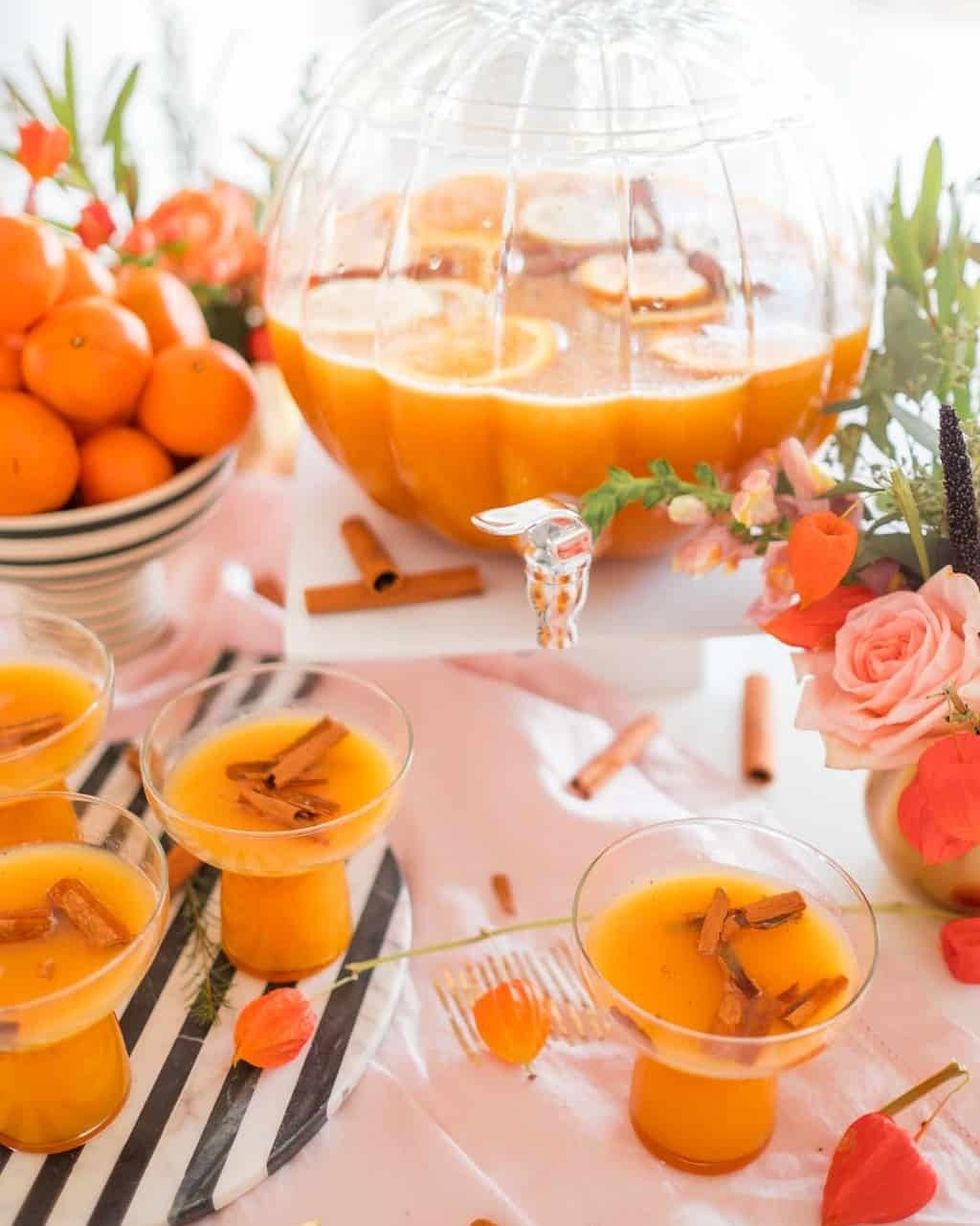 holiday pumpkin punch with flowers and oranges