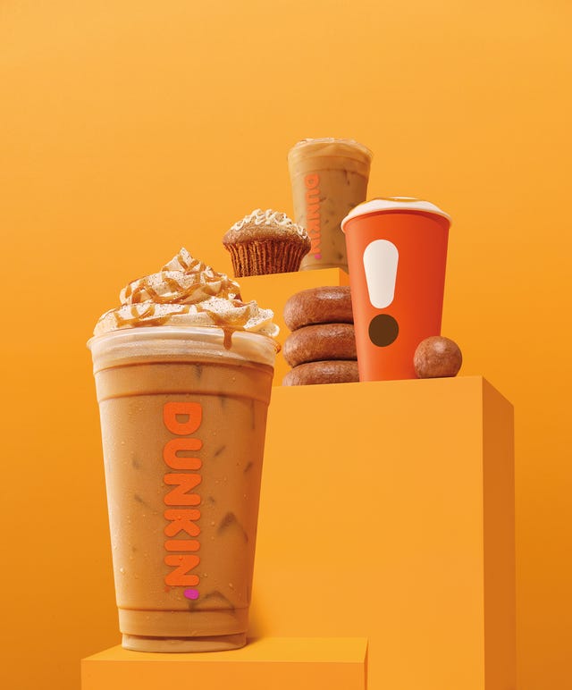 Food, Peach, Cone, Orange, Fast food, Cylinder, Dessert, Frozen dessert, Sweetness, Snack, 