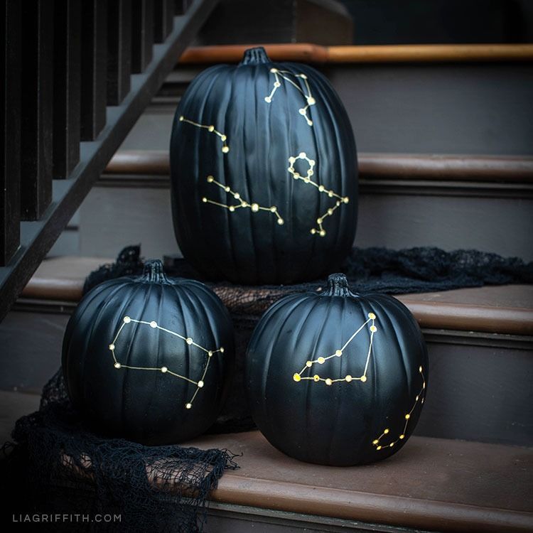pumpkin painting ideas three zodiac constellation pumpkin luminaries on front steps