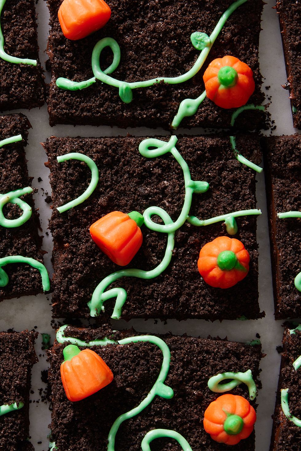 brownies with pumpkin candies and green icing