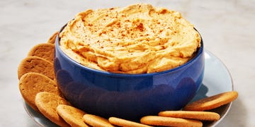 pumpkin pie dip sprinkled with cinnamon and served with gingersnaps