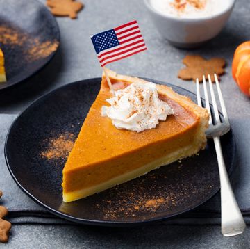 Pumpkin pie, tart made for Thanksgiving day with whipped cream