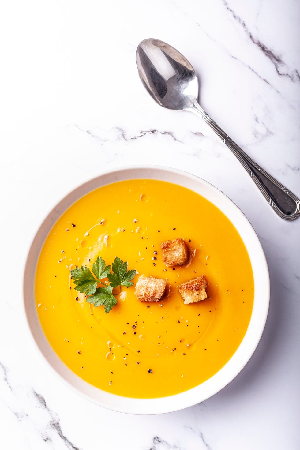 pumpkin soup on white background