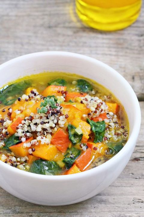 Pumpkin soup with quinoa and spinach.