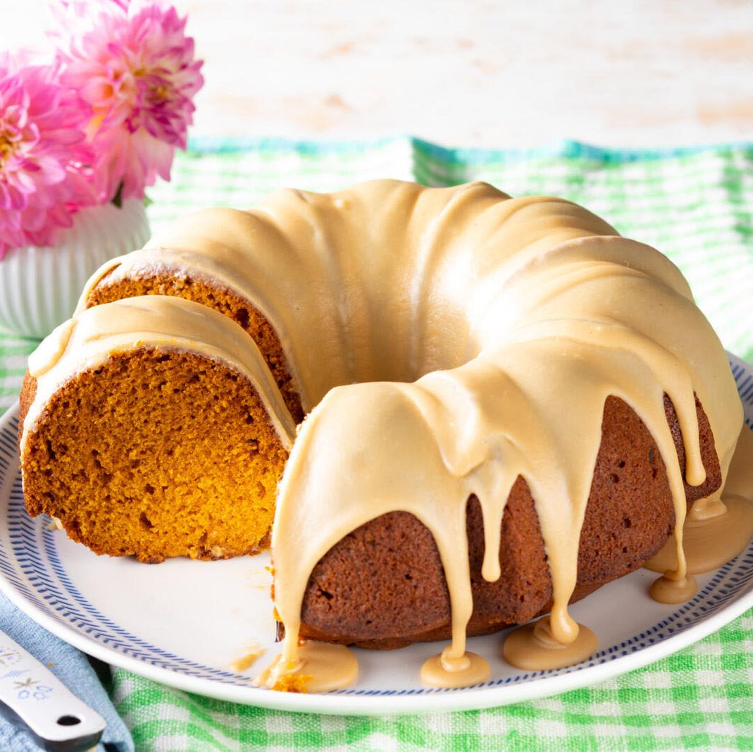 pumpkin spice cake recipe with brown sugar caramel glaze with a slice taken out