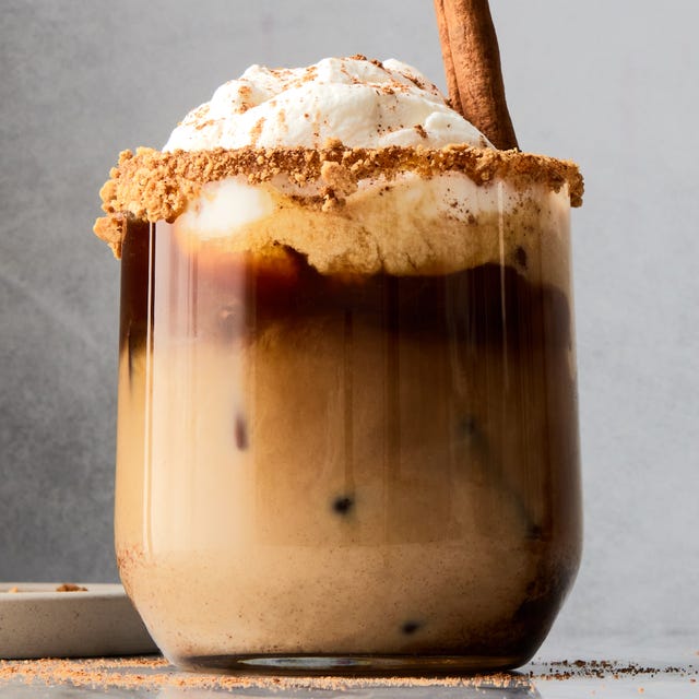 pumpkin spice white russians with cinnamon and whipped cream