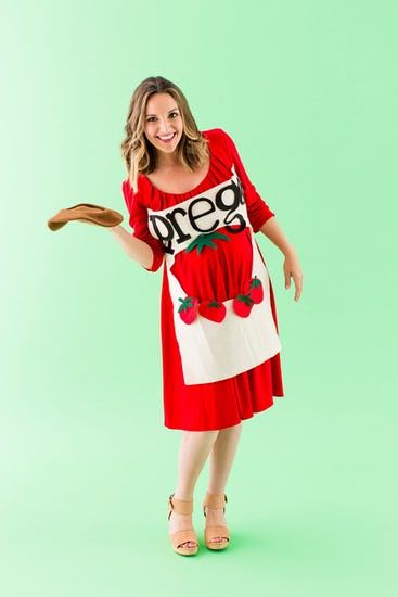 prego sauce maternity pun costume with red redress with white front that says prego, with tomato shaped cutout over stomach