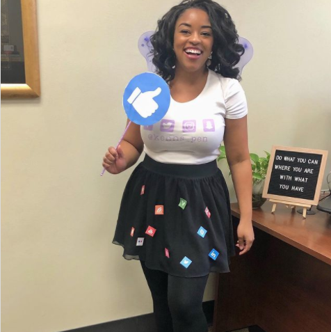 social butterfly halloween pun costume with butterfly wings and social media icons