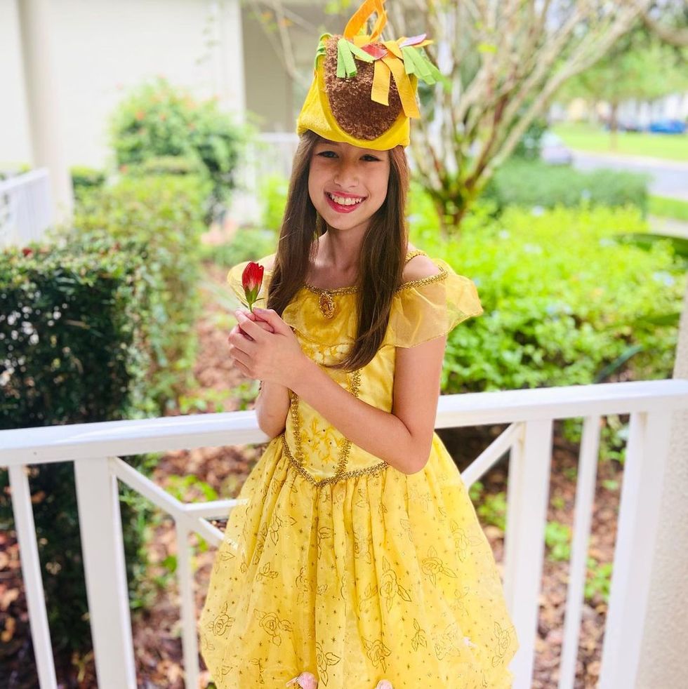 pun halloween costume with taco hat and yellow disney princess belle dress