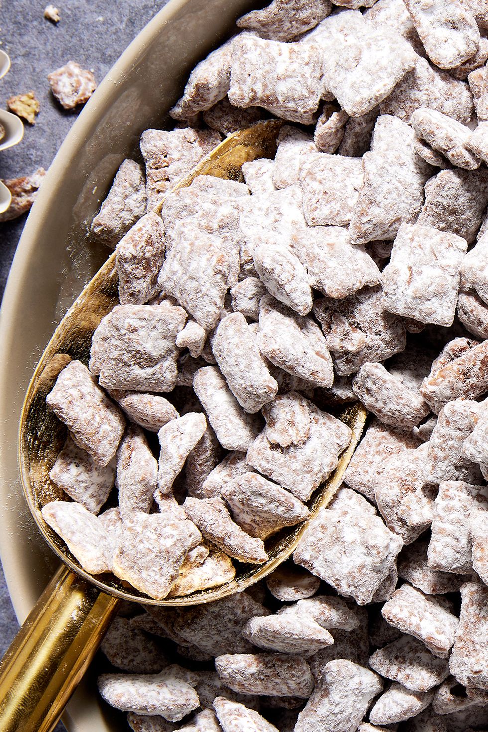 chex mix tossed in peanut butter and powdered sugar