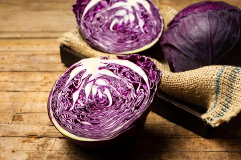 Purple cabbage on a rustic wooden table