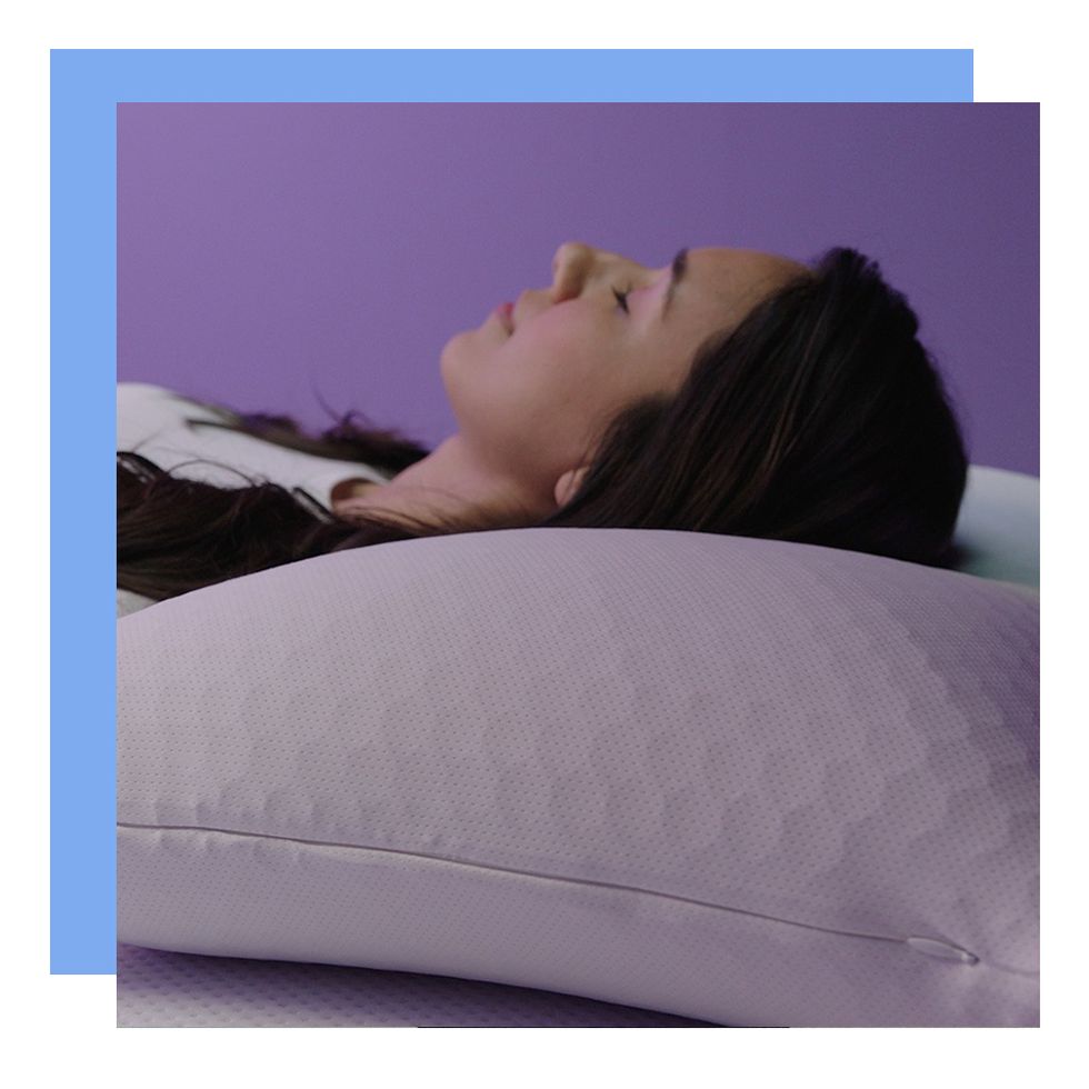 woman resting on purple harmony pillow