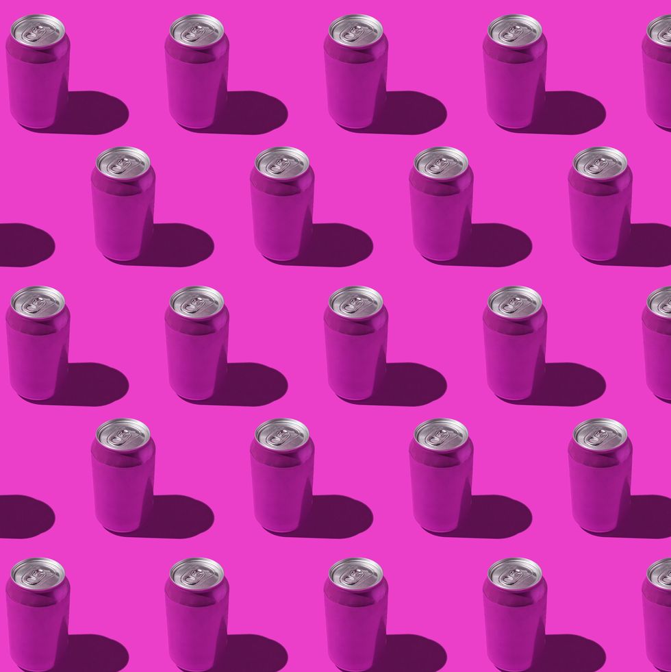 purple soda cans pattern with hard shadow on purple background