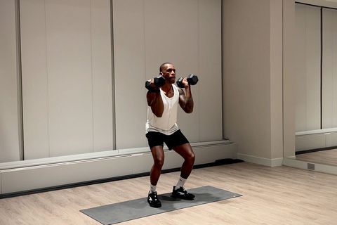 shoulder and arm workout, yusuf jeffers practicing push press exercise